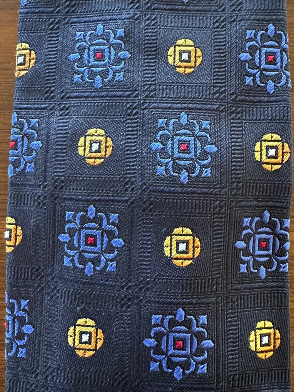 Holland & Sherry Classic Navy Silk Tie with Blue and Yellow Medallion Pattern